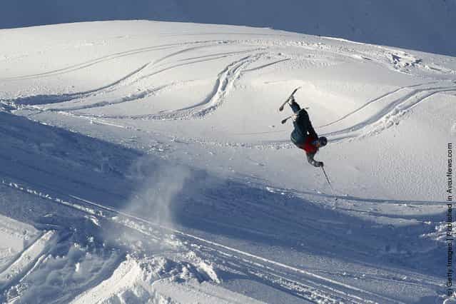 Freeskier Colin Hendrickson of Canada performs an air during the World Heli Challenge freestyle day in backcountry at Minaret Station on July 31, 2011 in Wanaka, New Zealand