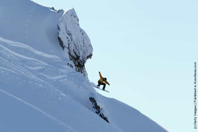 Freerider Shin Biyama of Japan launches off a drop during the World Heli Challenge freestyle day in backcountry at Minaret Station on July 31, 2011 in Wanaka, New Zealand