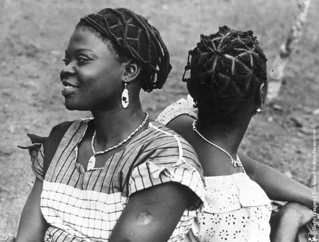 11th February 1956: Nigerian women from Ksukka with intricately coiffured hair which they have styled in honour of the visit of Queen Elizabeth II
