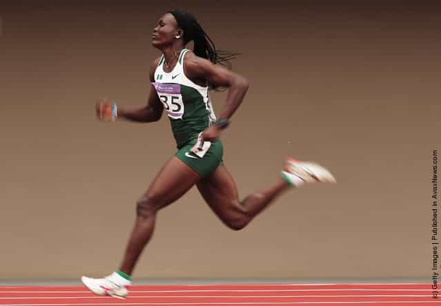 Josephine Omaka of Nigeria in action during the first round of the Girls 100m on day four of the Youth Olympics at Bishan Stadium on August 18, 2010 in Singapore
