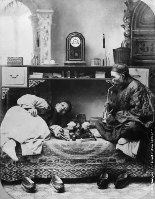 circa 1865: Chinese opium smokers