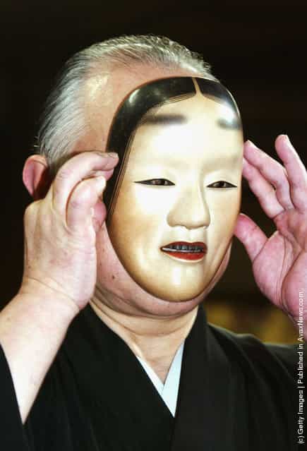 A renowned Noh actor, Otoshige Sakai, demostrates how to put on a Noh mask