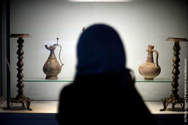 An ancient sculptures, pottery and bowls is displayed in the Kabul Museum August 4, 2011 in Kabul, Afghanistan