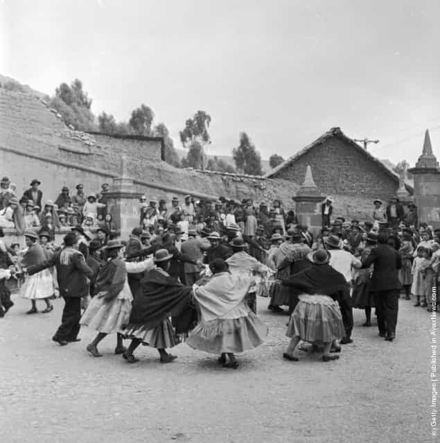 The citizens of Puno in the Peruvian Andes celebrate a wedding with a traditional dance, 1955