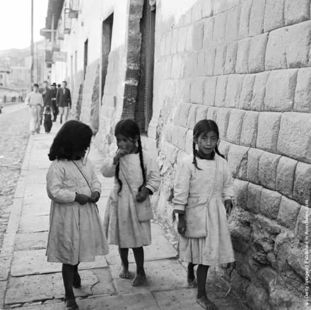 Three young girls in the streets of Cuzco, Peru, 1955