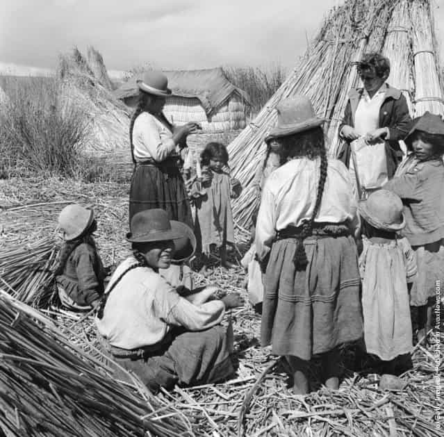 Families of native Uros indians live on small islands fashioned from reeds on Lake Titicaca, in Peru, 1955