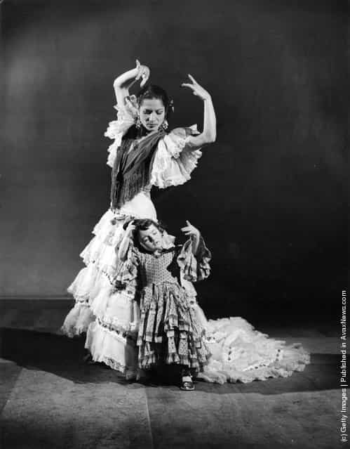 Flamenco dancer Carmen Amaya with a very young dancer