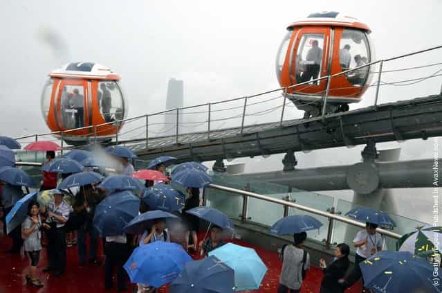 A general view of the ferris wheel on the roof of 450-metre-high Canton Tower during test run