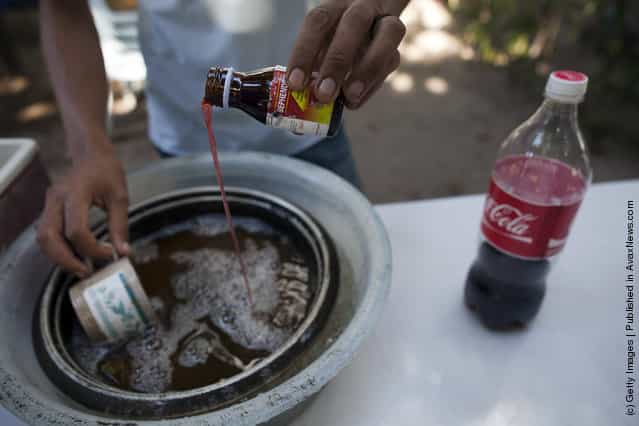 Thai Malay Muslim user mixes coke into 4 x 100, the popular cheap narcotic drink