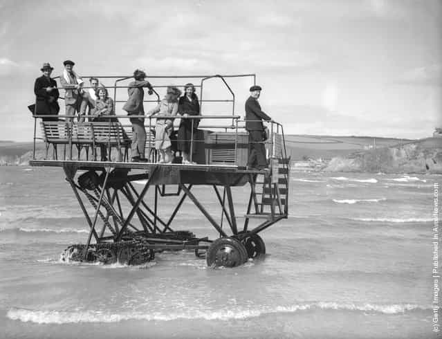 A caterpillar driven ferry with a 24 horsepower engine takes holidaymakers from the mainland at Bigbury in Devon to Burgh Island, a quarter of a mile away