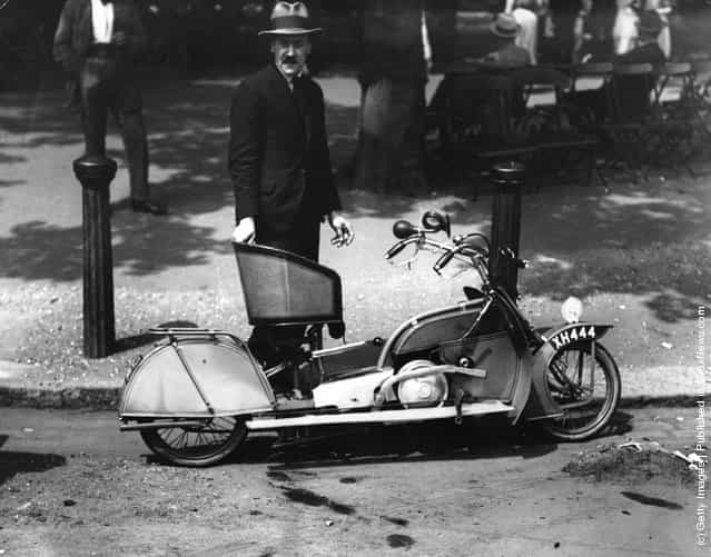 A man with his small, runaround cycle, 1921