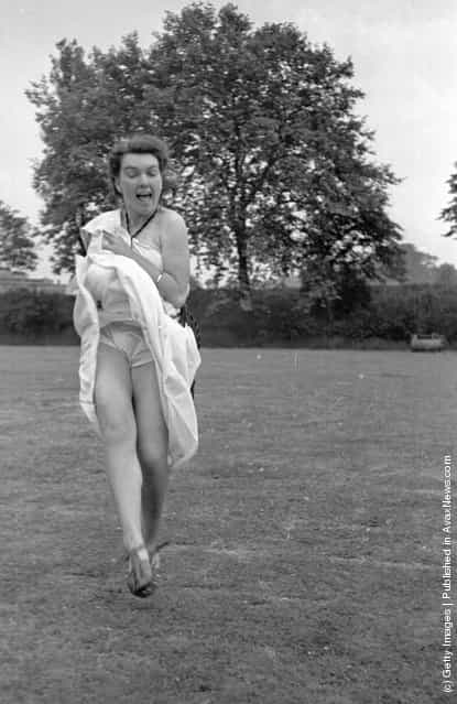 1948: One of the students shows a little more leg than necessary at a cricket match at the Goldsmiths Art College end of term party in London