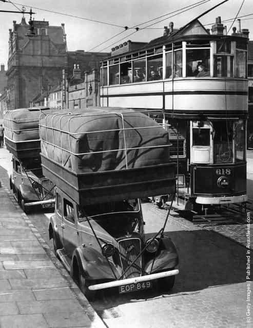 1940: Gas-driven taxis in a street in Birmingham