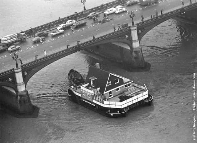 The Sunley House Afloat passing under Westminster Bridge