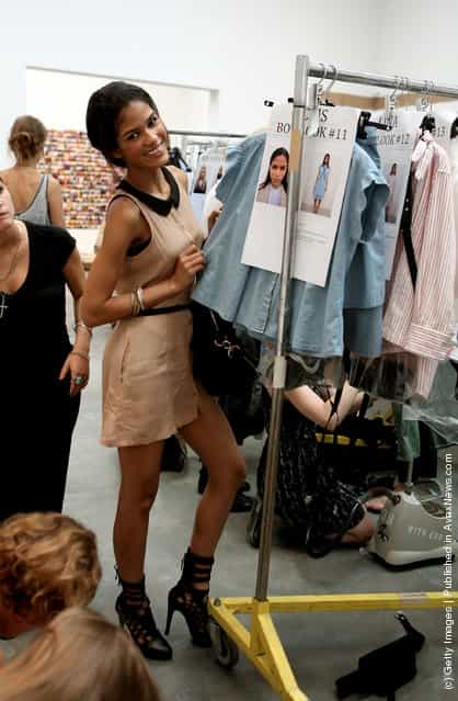 Models pose backstage Spring 2012 fashion show during Mercedes-Benz Fashion Week