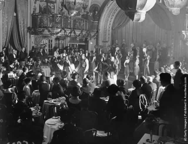 The audience watches the grand finale of the first ever afternoon cabaret performance in Britain, which took place in Princes Restaurant