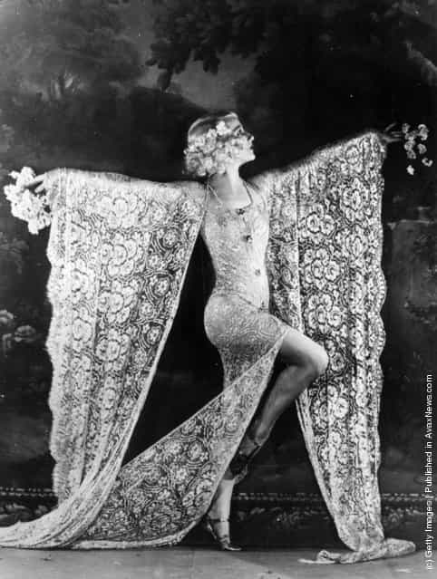 Dancer Edmonde Guydens dancing at the Moulin Rouge nightclub in Paris in a costume made of lace