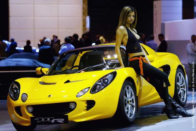 A model shows of the new Lotus elite the Sunday Times Motor Show Live