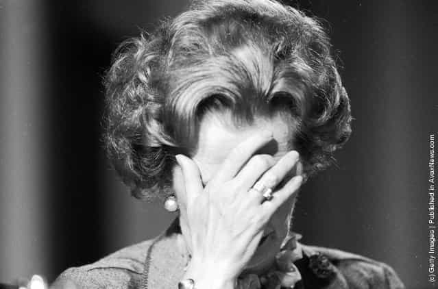 British prime minister Margaret Thatcher covering her face with her hand at the 1985 Conservative Party Conference