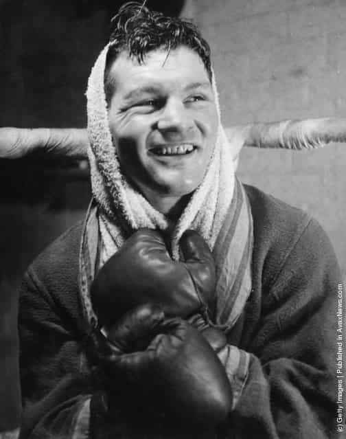 1950: Btritish heavyweight boxer Bruce Woodcock in cheerful mood after a training session