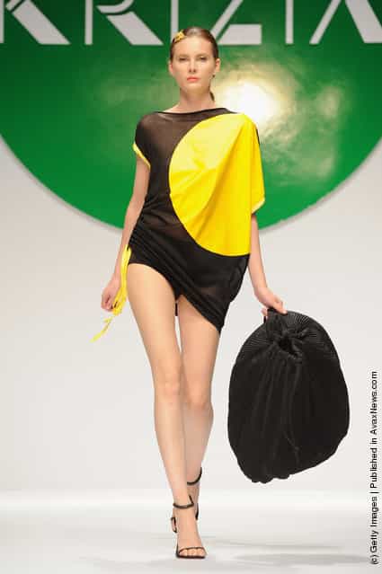 A model walks the runway at the Krizia Spring/Summer 2012 fashion show as part Milan Womenswear Fashion Week