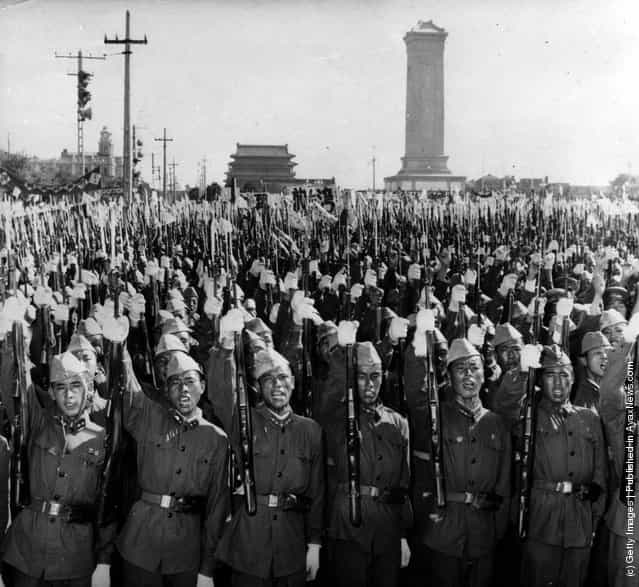 1958: Members of the Chinese Peoples Liberation Army shouting slogans on the streets of Peking (Beijing) in support of Premier Chou En-lais statement on the situation in the Formosa Straits