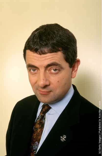 Rowan Atkinson poses for photographers before attending the world movie premiere of his BEAN movie