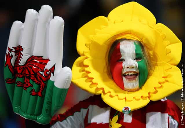 A young Wales fan cheers on her team during the IRB 2011 Rugby World Cup Pool D match between Wales and Namibia at Stadium Taranaki