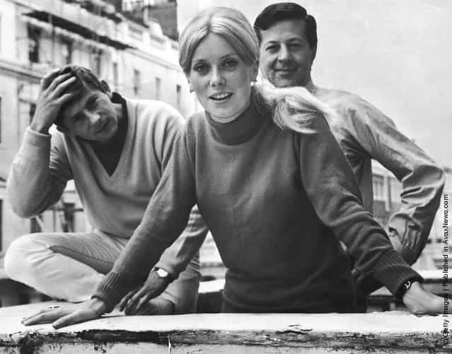 French actress Catherine Deneuve in London with Polish director Roman Polanski (left) and producer Eugene Gutowski, 17th August 1964. Deneuve is due to start shooting Polanskis film Repulsion in a weeks time