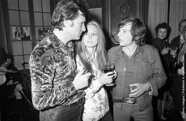 1971: Roman Polanski talking to Hugh Hefner, owner of the Playboy empire, who has sponsored his latest film Macbeth which stars Francesca Annis (centre)