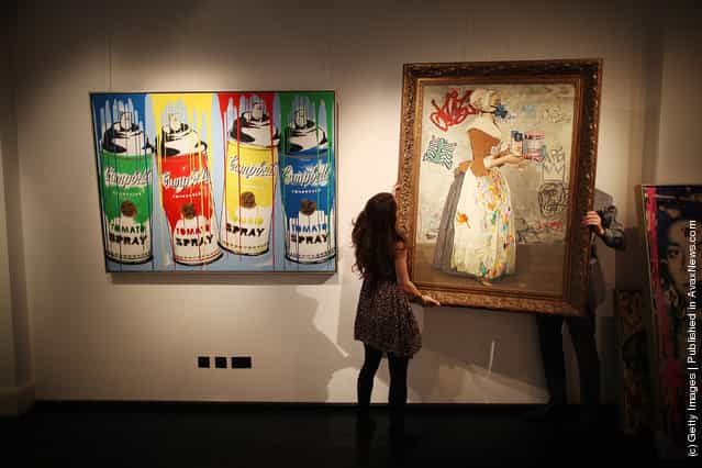 Chocolate Vandal (R) and Tomato Spray are hung at the Opera Gallery