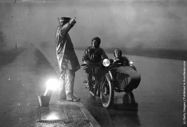 1932: An AA patrolman directs a motorcyclist who has lost his way