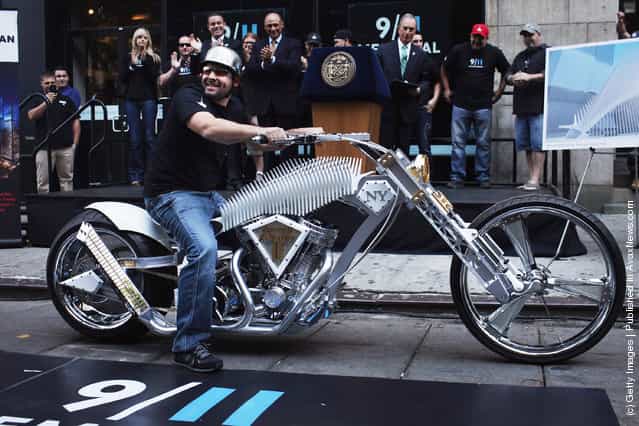 Paul Teutul Jr. of the television show American Chopper sits on a custom made World Trade Center inspired motorcycle in front of the 9/11 Memorial Preview Site