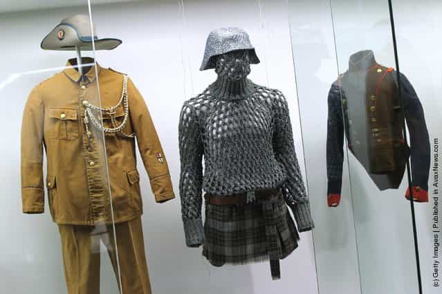 Uniforms and a military-inspired outfit designed by Vivienne Westwood