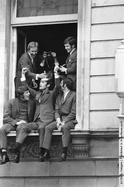 1970: Chelsea FC football players (clockwise from top left), Alan Birchenall, John Hollins, Peter Osgood, John Dempsey and Ian Hutchinson, celebrating their FA Cup victory over Leeds