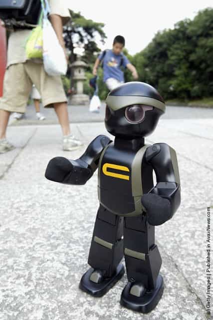 Chroino, the robot, is introduced by its creator Tomotaka Takahashi at Kyoto University