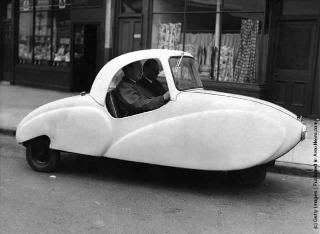1954: A new Peoples Car, with an entirely plastic body, designed to seat three adults and two children and marketed as the cheapest car on the road