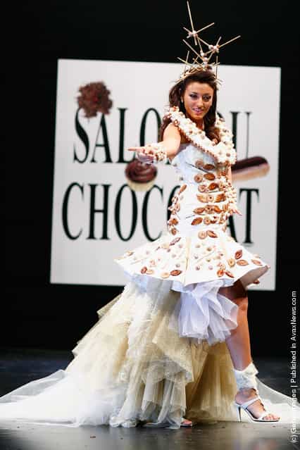 Rachel Trapani displays a chocolate decorated dress during the Chocolate dress fashion show
