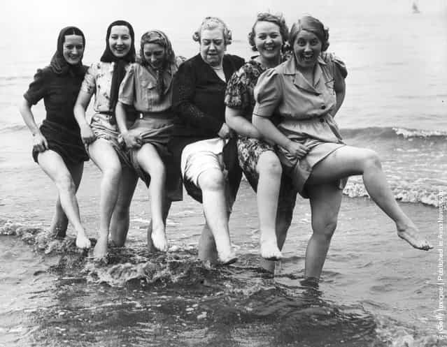 1939: Music hall singer Florrie Ford cavorting in the sea at Morecambe in Lancashire with her companions