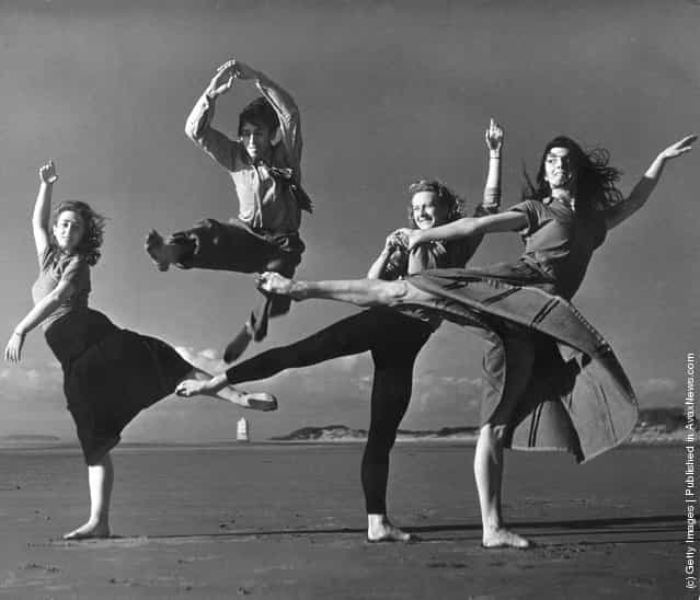 1953: Saint James Ballet Company limber up on the beach at Burnham in Somerset