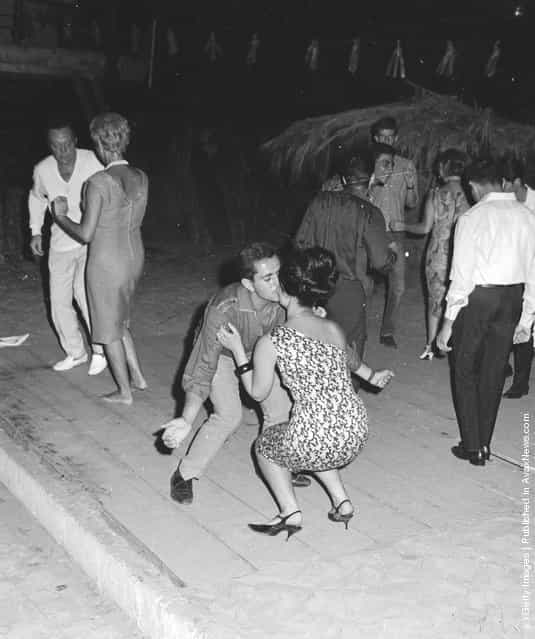 1965: Late night revellers dancing in the Acapulco beach area of Beirut