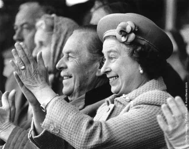 1985: Queen Elizabeth II applauds enthusiastically as her husband, Prince Philip, the Duke of Edinburgh, tackles the obstacle course for coaches at the Royal Windsor Horse Show