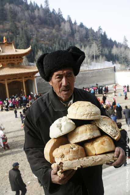 Villagers donate their bread to lamas