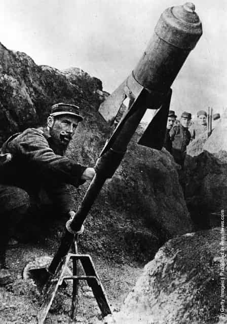 1914: A French air-torpedo being fired from the trenches