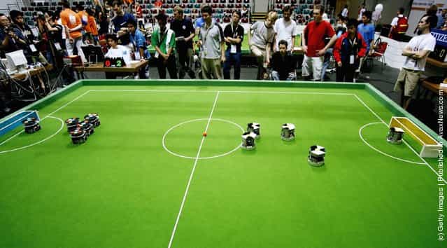 Small size robots in action during the Robocup