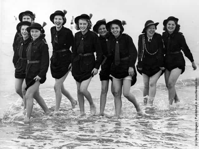 1939: Girls of the 7th Manchester Regiment Church Girls Brigade (Rochdale Battalion) who are in camp at Bridlington, making the most of their holiday by the sea