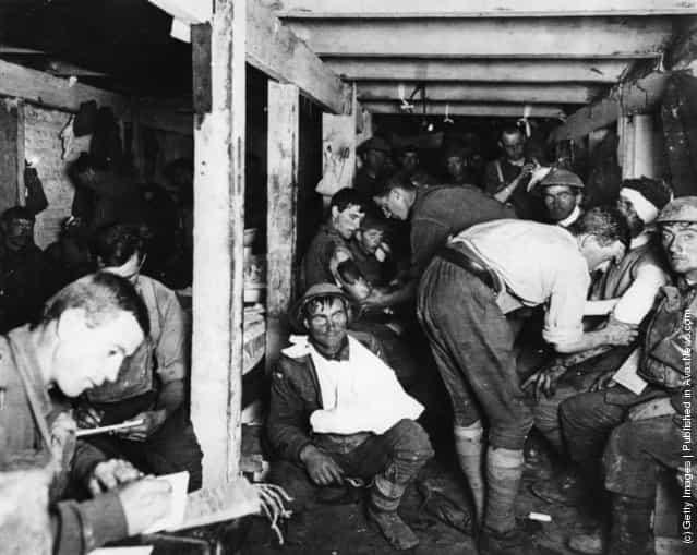 British tommies relaxing and having wounds treated in an underground forward dressing station by the Menin Road in France