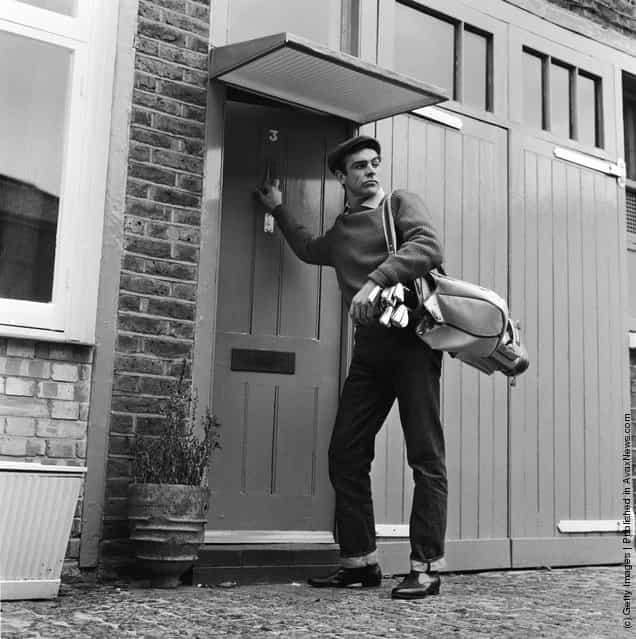 1962: Scottish actor Sean Connery, the new face of superspy James Bond, leaves his basement flat in Londons NW8 for a game of golf, his favourite pastime