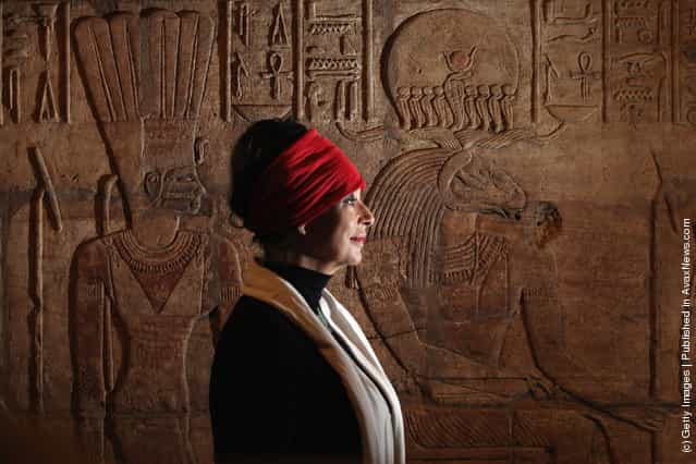 Artist Sue Goddard views detail on the Shrine of Taharqa in the Ashmolean Museums new exhibition of artifacts from ancient Egypt and Nubia