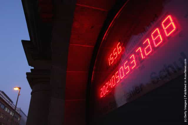 A debt meter, ostensibly showing the current level of the German national debt, reads over EUR 2 trillion over the entrance to the Federation Of Tax Payers in Berlin, Germany